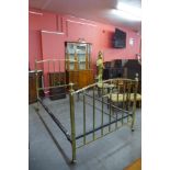 A Victorian brass double bed