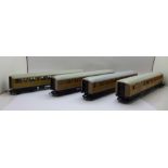 Four Hornby OO gauge model railway carriages