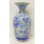 A 19th Century Chinese blue and white vase, small chip to rim, 25cm