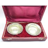 Two dishes marked silver, boxed, 69.4g