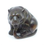 A signed tiger netsuke