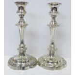 A pair of plated Victorian candlesticks, circa 1838, 23cm