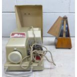 A vintage Maelzel metronome and an Aldis 35mm slide projector **PLEASE NOTE THIS LOT IS NOT ELIGIBLE