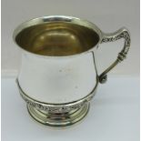 A silver mug with Celtic style decoration, Birmingham 1934, Adie Brothers, also marked Finnegans