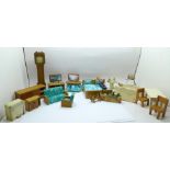 A collection of 1960's/70's dolls house furniture and a doll