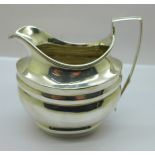 A George III silver cream jug, London 1802, 139g