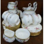 A Royal Albert Tenderness six setting tea set with cereal bowls, cream and sugar, cup a/f and some
