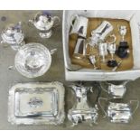 A box of silver plated items, rose bowl, four trophies, three piece tea service, tankards, etc.