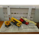 Three Dinky Toys model cranes diorama, comprising Jones Fleetmaster, Coles Hydra Truck and Coles