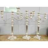 Three matching silver plated plated candelabra, (2+1), tallest 51cm