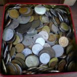 A tin of foreign coins, 5.68kg