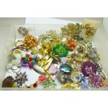 Sixty costume brooches