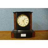 A 19th Century French faux Belge noir mantel timepiece