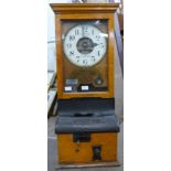 An early 20th Century oak time recorder, by National Electric Company Ltd., Blackfriars, London