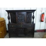 A 17th Century Welsh carved oak cwpard deuddarn