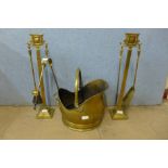 A brass companion set and a brass coal bucket