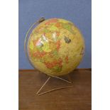 A jigsaw terrestrial globe on stand