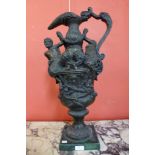 A large Italian Renaissance style bronze ewer, on green marble socle