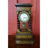 A 19th Century French inlaid rosewood portico clock, with turned barleytwist columns, the enamel