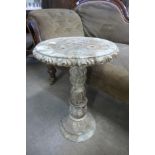 An Italian style marble jardiniere stand