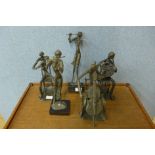 Five cast metal stylised figures of musicians