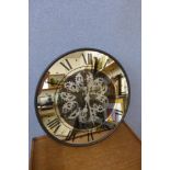 A French style skeleton circular wall clock