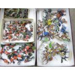 Two boxes of plastic model soldiers