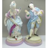 A pair of late 19th Century Dresden figures of a Gallant and his Lady, small chip to tricorn hat