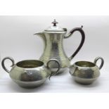 A Trafalgar Arts and Crafts hand beaten pewter tea service