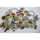 A collection of costume jewellery including brooches, etc.