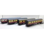 Four Hornby OO gauge model rail carriages