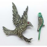 Two bird brooches, one formed as a budgerigar with green enamel body and marcasite wing, the other