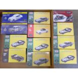 Twelve 1:43 scale model vehicles by Atlas Editions, boxed