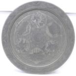 A Persian metal charger with detailed etched decoration of Indian scenes and soldiers on