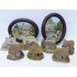 A collection of Lilliput Lane cottages, some a/f, and two Lakeland Studio Relief moulded wall