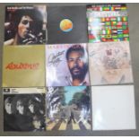 Six The Beatles LP records including White album and other LP records, Bob Marley, etc.