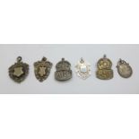 Two silver ARP badges, three silver fob medals and a coin fob