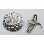 Two silver brooches; a Scandinavian sterling silver brooch of a Viking ship and a silver brooch