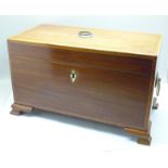 A George III inlaid mahogany tea caddy with fitted hinged compartments, lacking centre jar, 30 x