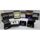 Ten pairs of silver cufflinks boxed