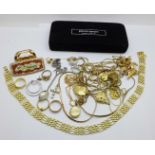 A collection of gold tone jewellery, etc.