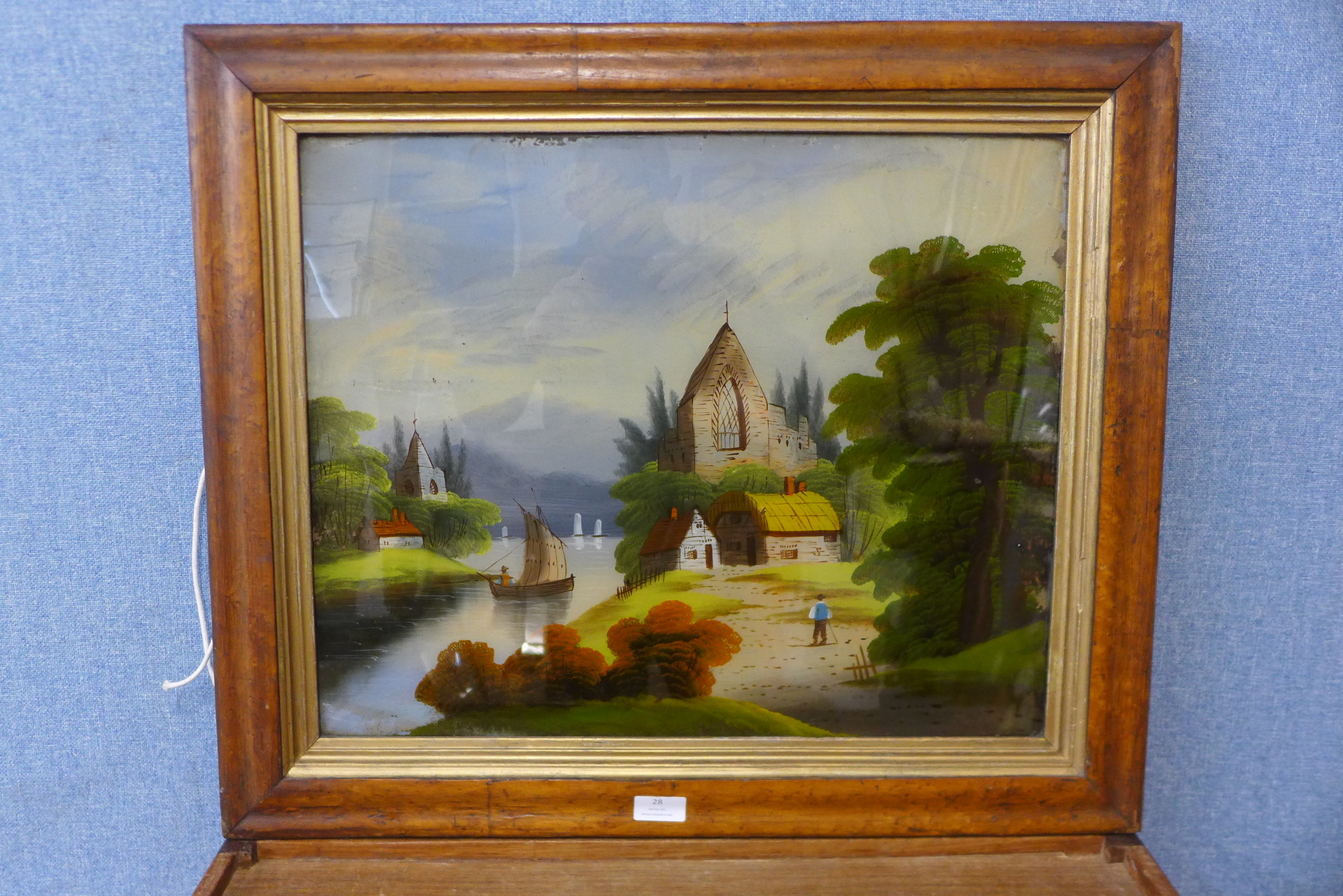 English School (19th Century), river scene, reverse oil painting on glass, framed