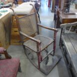 A Victorian oak bergere invalid chair