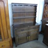 A carved oak dresser