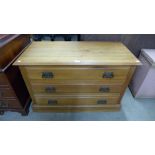 An Edward VII satin birch chest of drawers