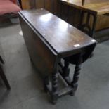 A Charles II oak gateleg table