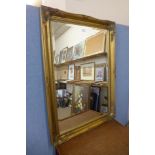 A gilt framed mirror