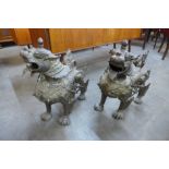 A pair of large Chinese bronze dragons