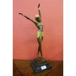 Manner of Demetre Chiparus, Art Deco style bronze figure of a dancer, on black marble socle