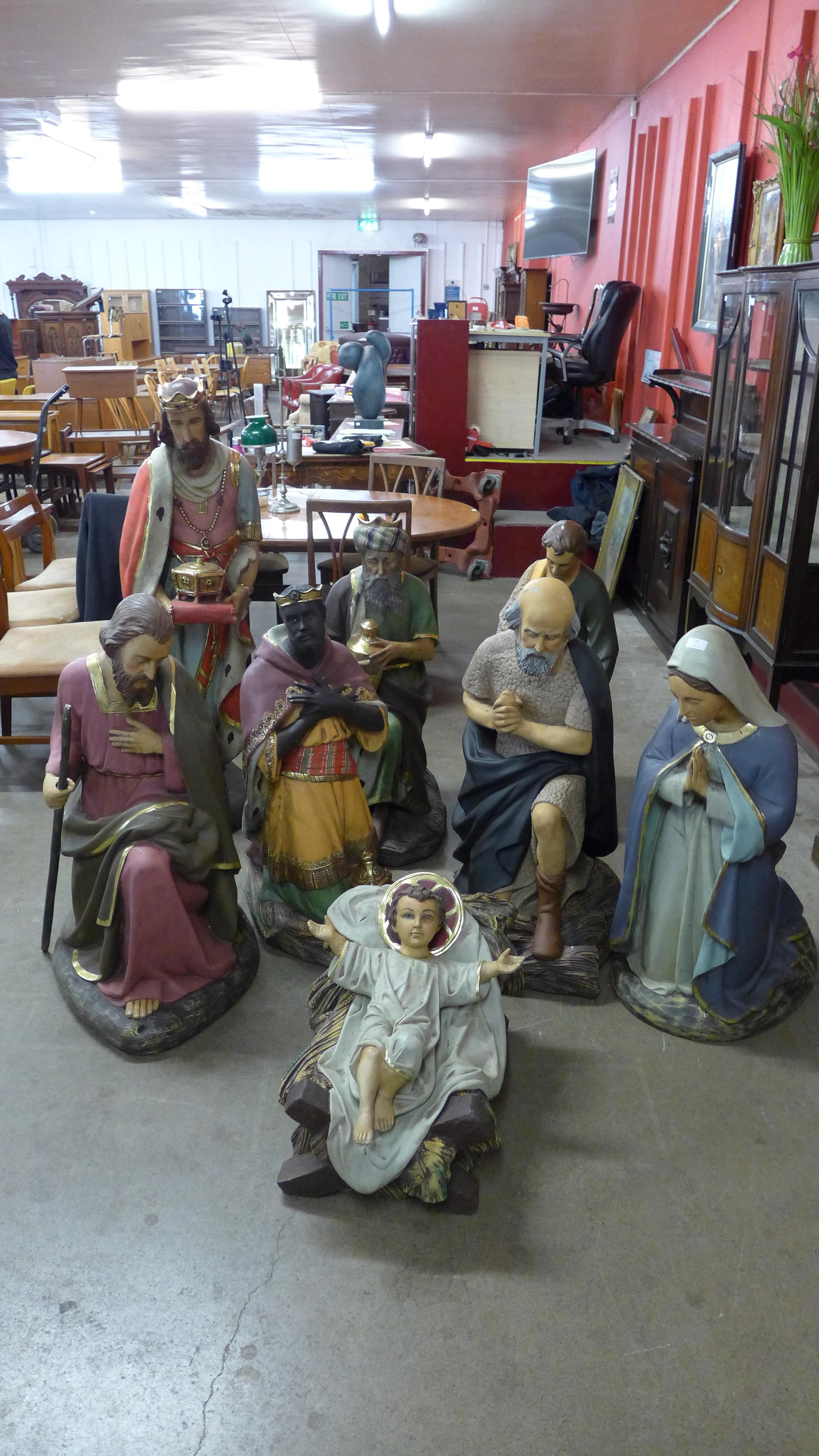 A painted eight piece Nativity set